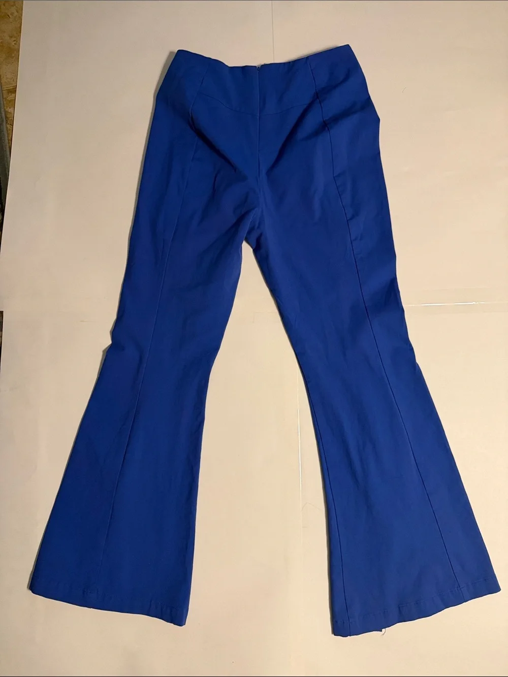 Free People Real Deal Slit Flare pants w/vibrant blue color distinct hem slits.